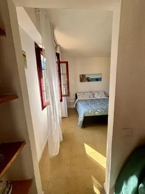 Letto o letti in una camera di La casetta di Tato