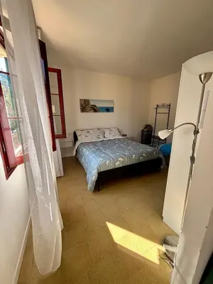 Letto o letti in una camera di La casetta di Tato