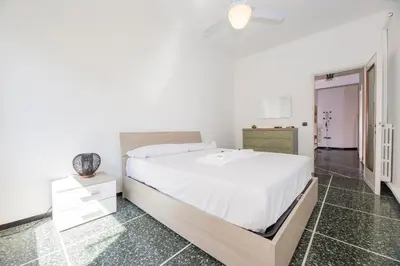 Letto o letti in una camera di JOIVY Pesto Home Holiday