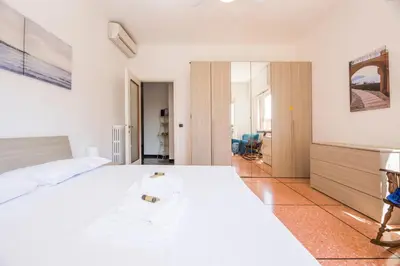 Letto o letti in una camera di JOIVY Pesto Home Holiday