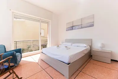 Letto o letti in una camera di JOIVY Pesto Home Holiday