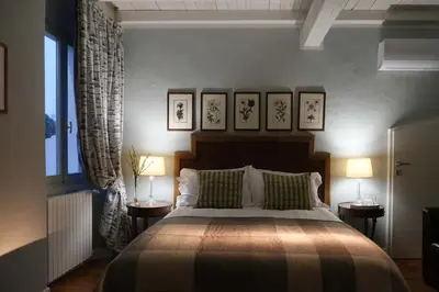 Letto o letti in una camera di Residenza Paulonia