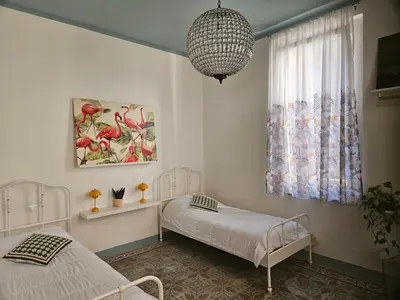 Letto o letti in una camera di Casa Ichnusa