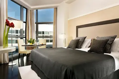 Letto o letti in una camera di Hotel La Favorita