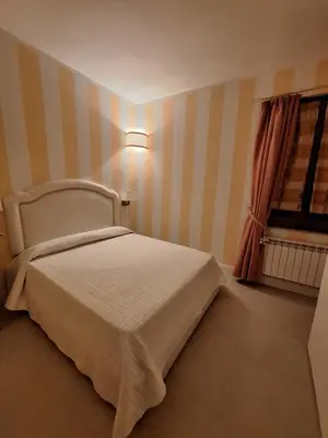 Letto o letti in una camera di Casa Tulliola