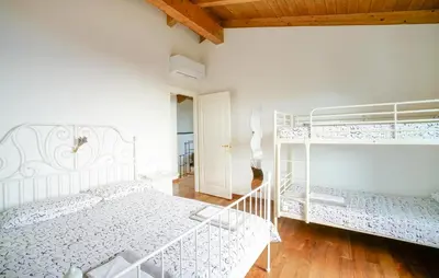 Letto o letti in una camera di Cozy Home In Chiavari
