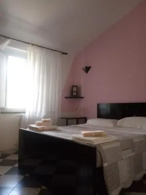 Letto o letti in una camera di Villa Carla
