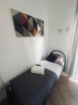 Letto o letti in una camera di 5 Terre Migliarina