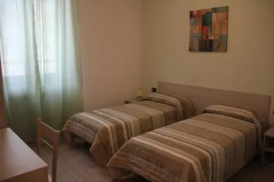 Letto o letti in una camera di Agriturismo A' Taversa