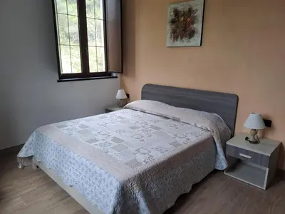 Letto o letti in una camera di Agriturismo A' Taversa