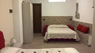 Letto o letti in una camera di Agriturismo A' Taversa