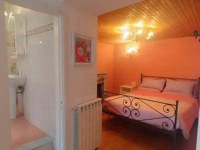 Letto o letti in una camera di CasafioRita