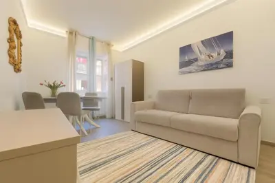 Area soggiorno di WELCOME RIVIERA-MAZZINI 30- Bagno e arredamenti nuovi- Centralissimo a 100 m dalle spiaggie-Parcheggio a 15 euro al giorno, da prenotare