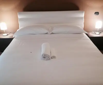 Letto o letti in una camera di Residence Cà Mazzini