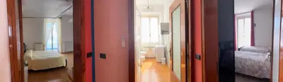 Letto o letti in una camera di Affittacamere IL Tulipano Sestri Levante