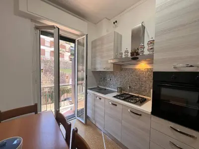 Cucina o angolo cottura di JOIVY Inviting 1-bedroom flat with Balcony in Rapallo
