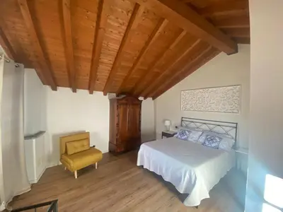 Letto o letti in una camera di Cà La Torre