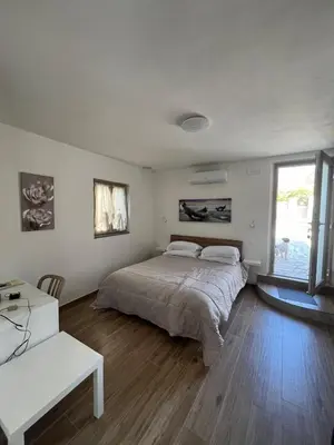 Letto o letti in una camera di House Holidays da Oneglia