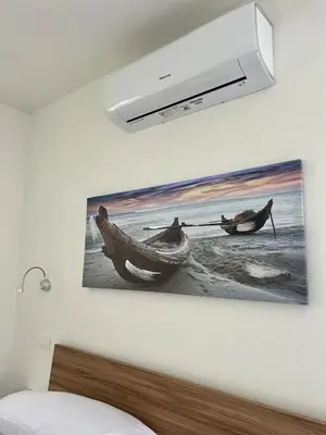Letto o letti in una camera di House Holidays da Oneglia