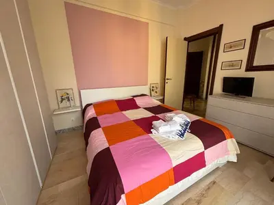 Letto o letti in una camera di Casa Nina by Holiday World