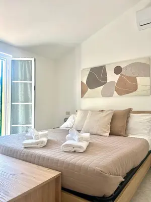 Letto o letti in una camera di Ardesia apartment