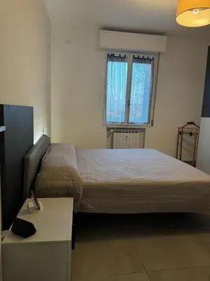 Letto o letti in una camera di Domus Plinio