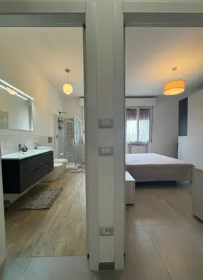 Letto o letti in una camera di Domus Plinio