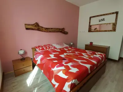 Letto o letti in una camera di Sunny House -Charming apartment in the nature