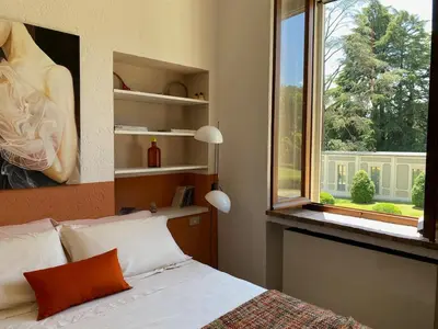 Letto o letti in una camera di La finestra sul parco Croara Country Club