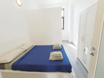 Letto o letti in una camera di La casa di Simo