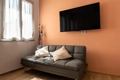 TV o dispositivi per l'intrattenimento presso elegante casa centrale