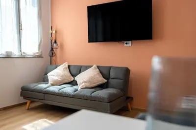 TV o dispositivi per l'intrattenimento presso elegante casa centrale