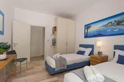 Letto o letti in una camera di Dimora degli Agrumi - 200m dal Mare con Terrazzo