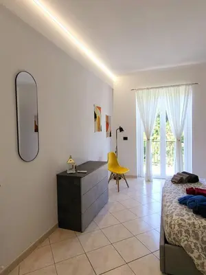 Letto o letti in una camera di Casa Dolce Casa, a 10 minuti dal mare