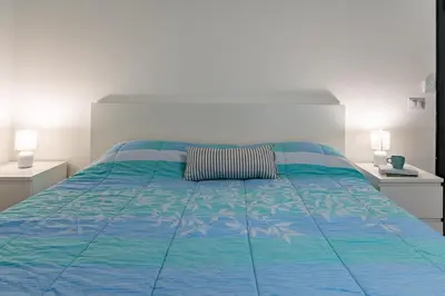 Letto o letti in una camera di Approdo