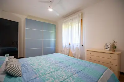 Letto o letti in una camera di Approdo