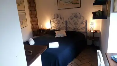Letto o letti in una camera di Tra Mare e Luna