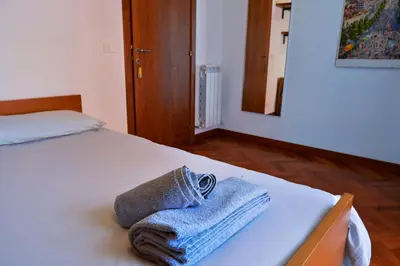 Letto o letti in una camera di Casa Giorgi