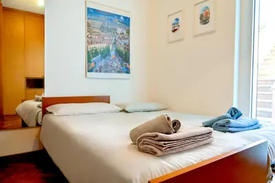 Letto o letti in una camera di Casa Giorgi
