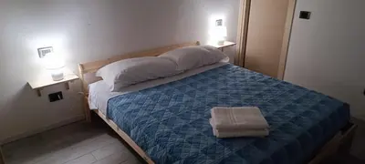 Letto o letti in una camera di Appartamento I 2 archi
