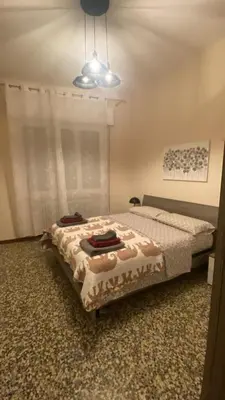 Letto o letti in una camera di Mantova sweet home