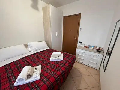 Letto o letti in una camera di B&B Canossa