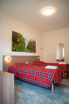 Letto o letti in una camera di roveleto camere