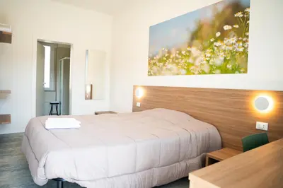 Letto o letti in una camera di roveleto camere