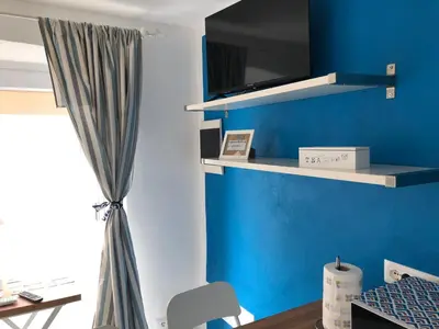 TV o dispositivi per l'intrattenimento presso Dantis Domus at the beach