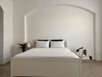 Letto o letti in una camera di Loft Cream Cremona