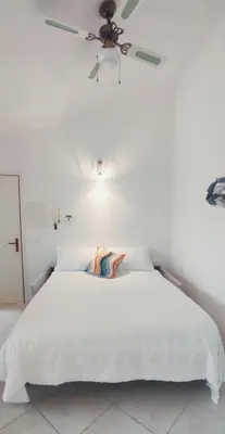 Letto o letti in una camera di Casa Milo