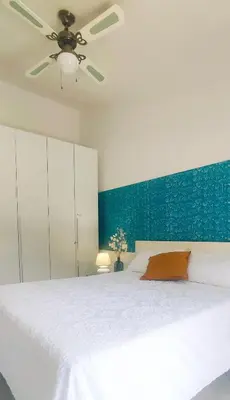 Letto o letti in una camera di Casa Milo