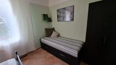 Letto o letti in una camera di Foresteria due Galli