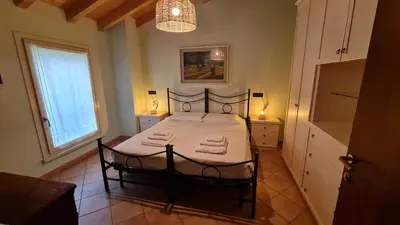 Letto o letti in una camera di Foresteria due Galli